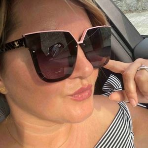 Brand New Chanel sunglasses pink border